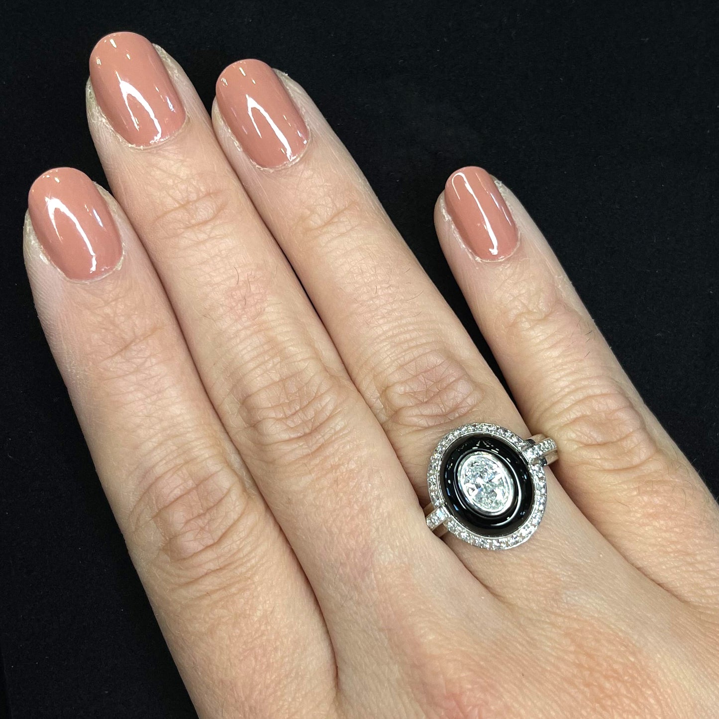 Bague en platine avec diamants et onyx