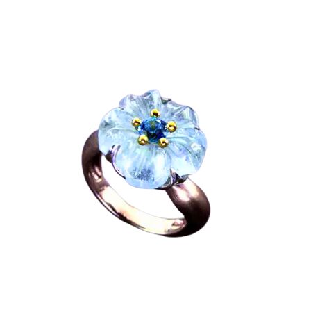 Bague en aigue-marine sculptée et saphir bleu